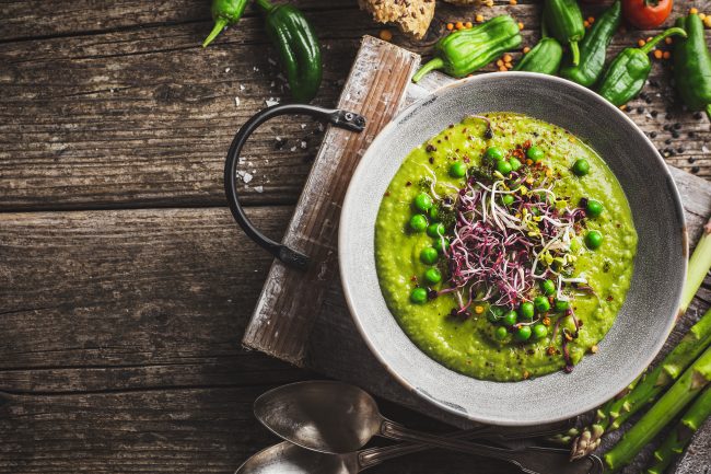 Healthy green pea soup served